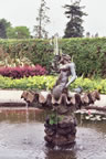 The mermaid fountain within the walled garden.